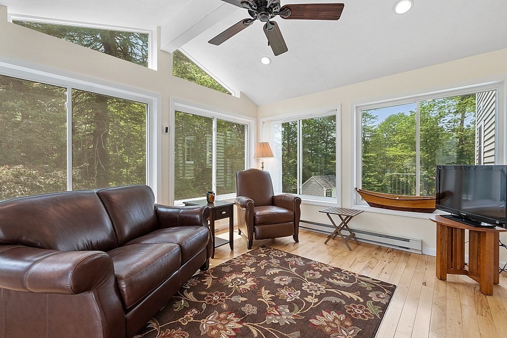 54 Little Turnpike Road Shirley, MA 01464 - Photo 9 of 39 a living room with furniture and a large window