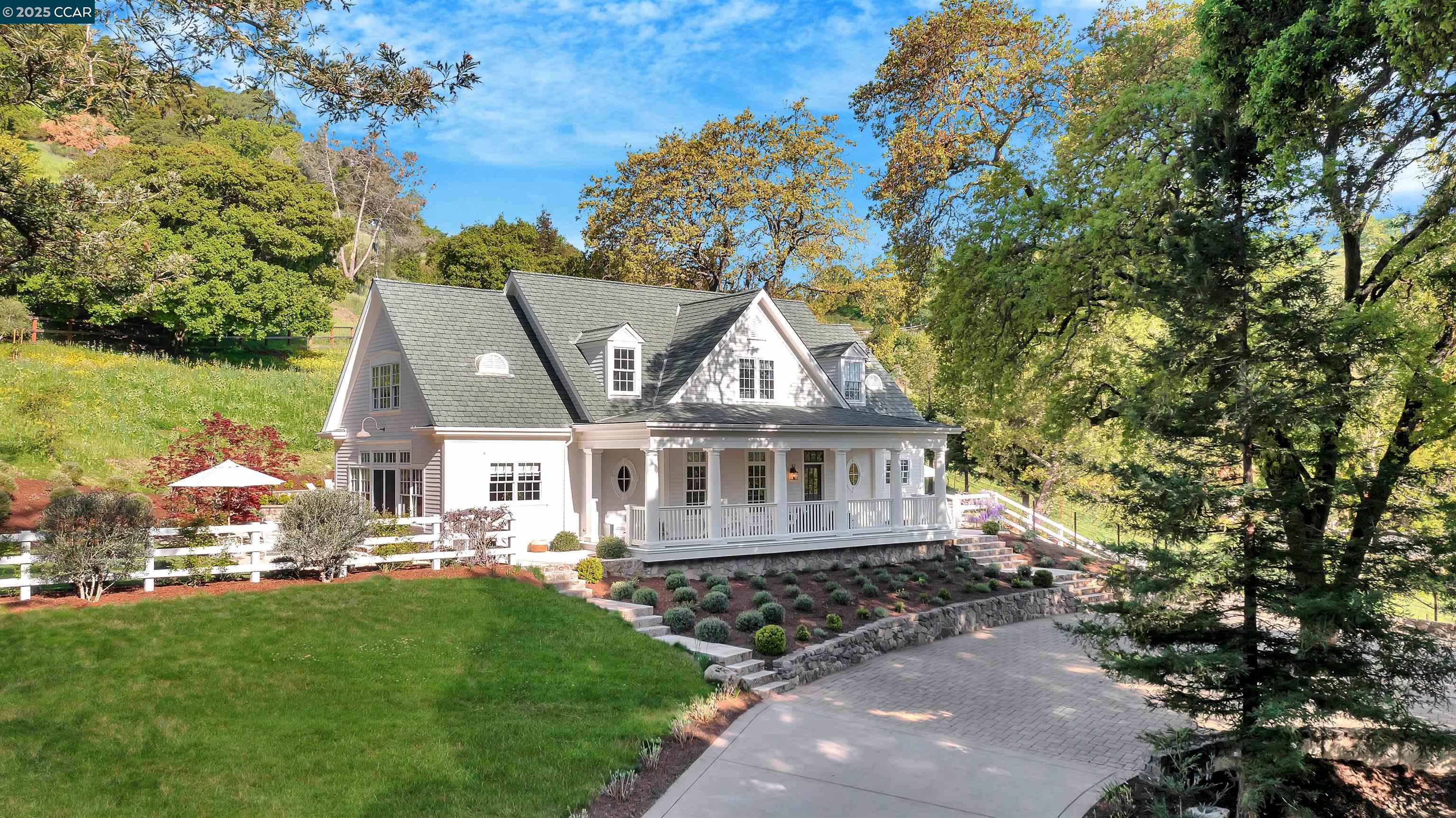 front view of a house with a garden