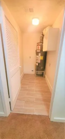 a view of a bathroom with a sink and a vanity