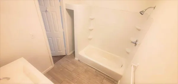 a view of a back yard of the house