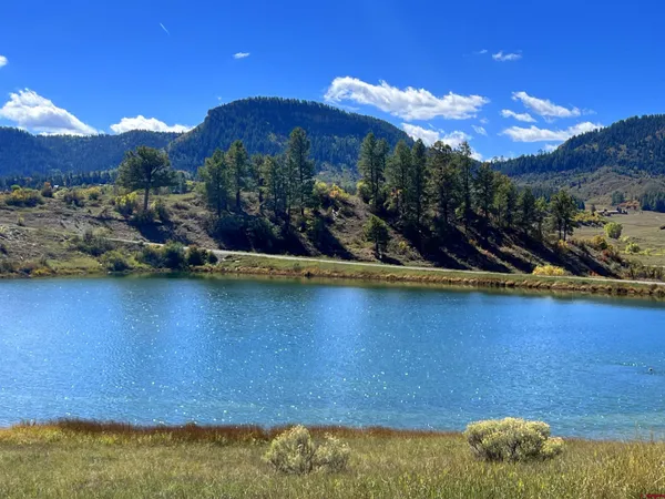 a view of a lake in middle of the town
