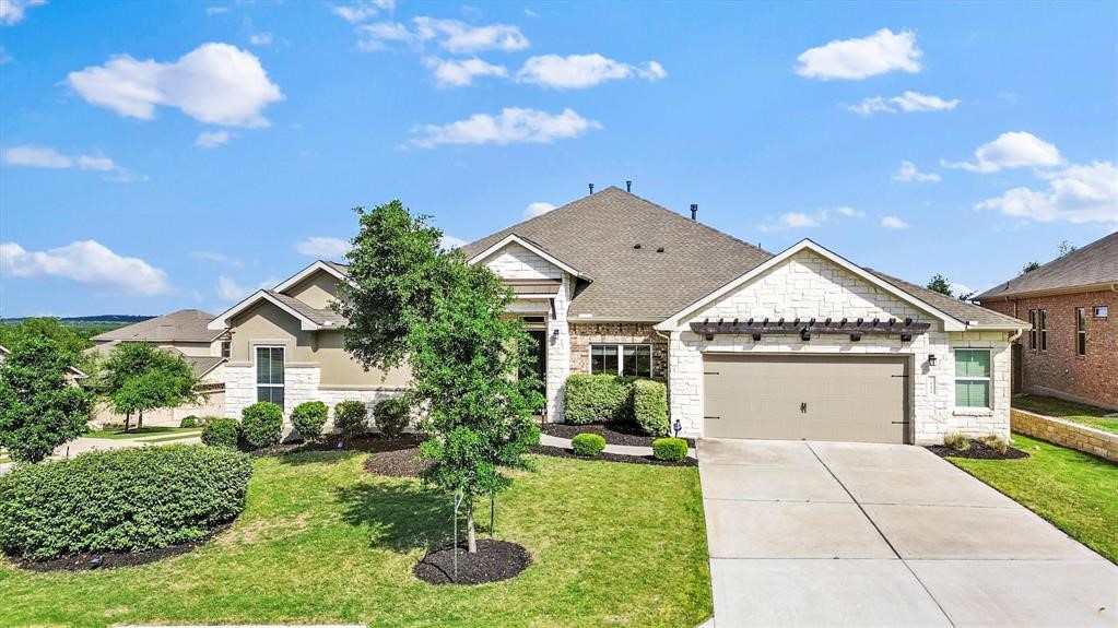 111 Tabago Court Austin, TX 78737 - Photo 1 of 22 a view of house with garden