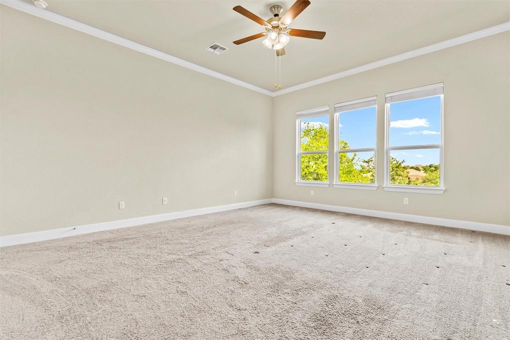 111 Tabago Court Austin, TX 78737 - Photo 13 of 22 an empty room with windows and closet