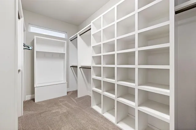 a view of an empty walk in closet