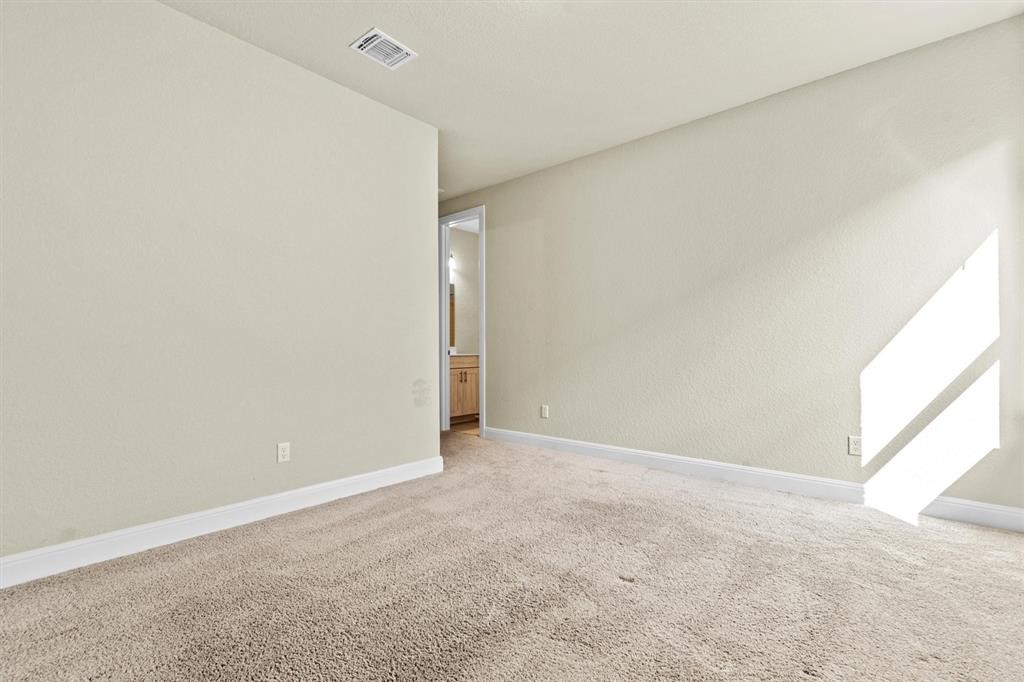 111 Tabago Court Austin, TX 78737 - Photo 17 of 22 a view of an empty room