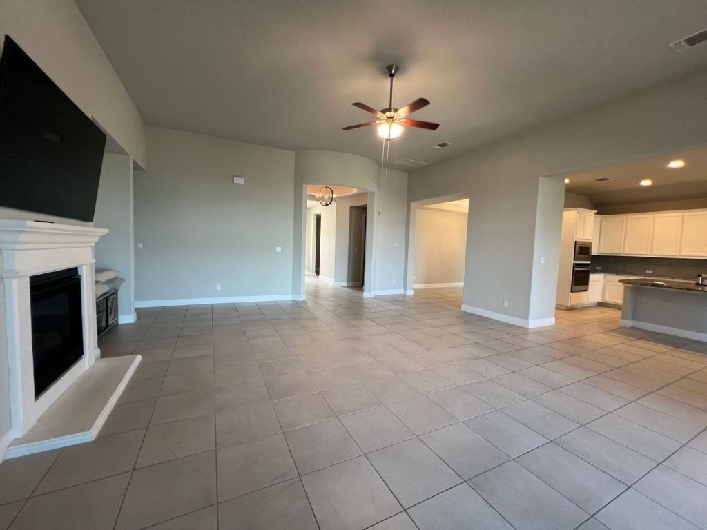 111 Tabago Court Austin, TX 78737 - Photo 9 of 22 a view of a livingroom with a fireplace