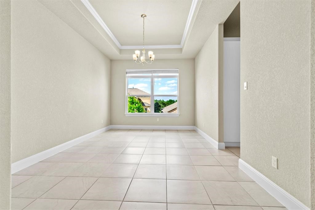 111 Tabago Court Austin, TX 78737 - Photo 10 of 22 a view of an empty room and window