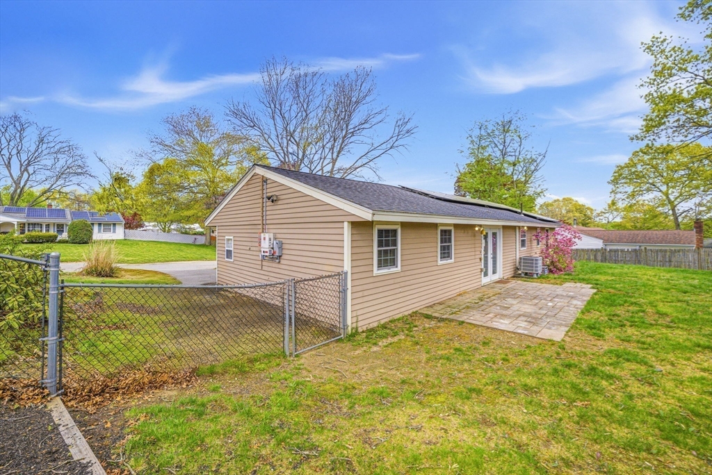 157 Errol Road Brockton, MA 02302 - Photo 6 of 34 a view of a house with backyard and a tree