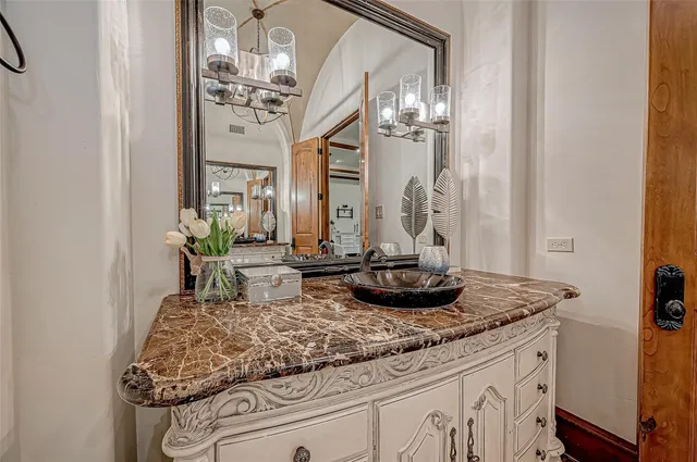 a spacious bathroom with a bathtub and shower