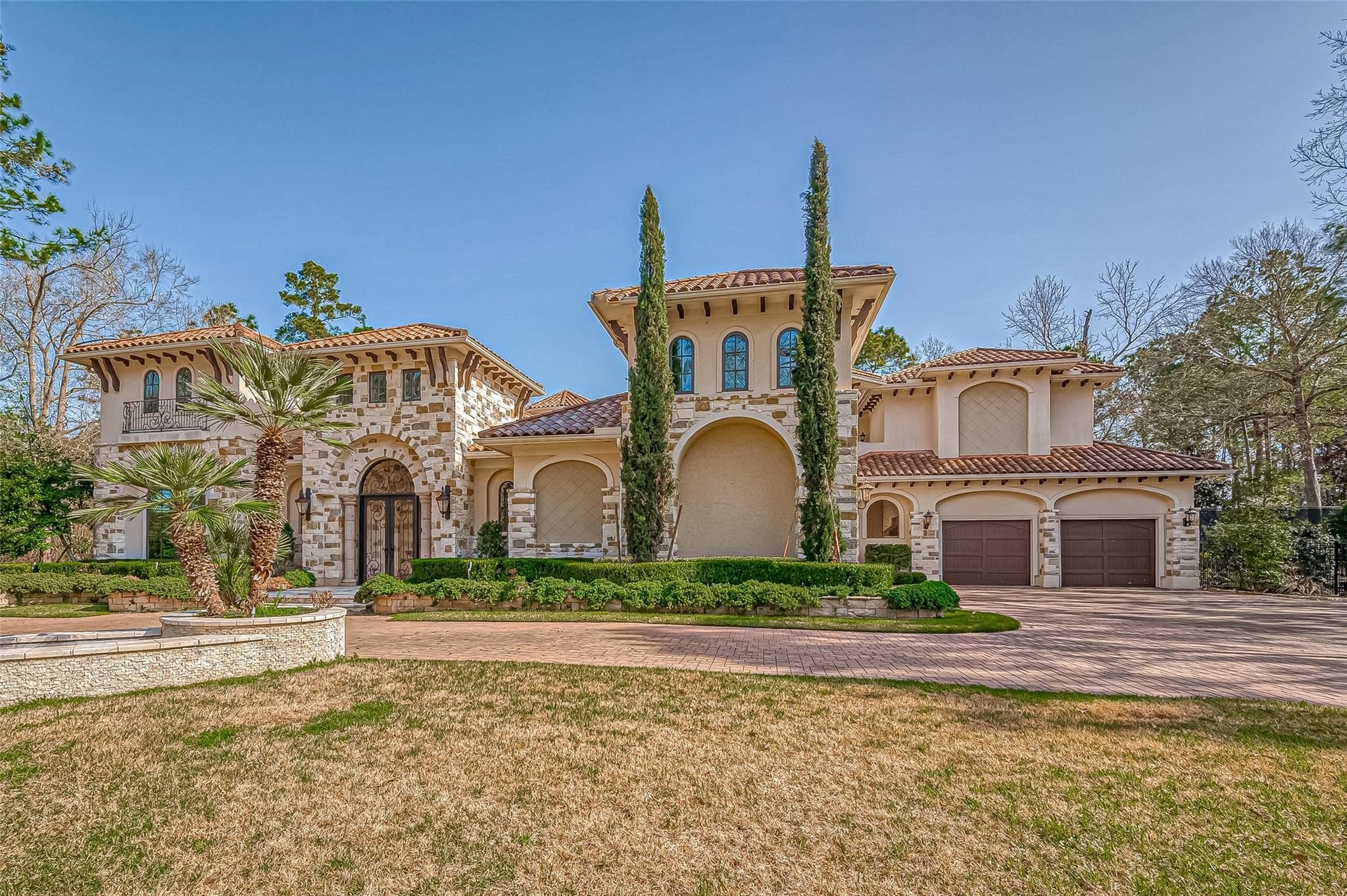 3 Congressional Circle Spring, TX 77389 - Photo 3 of 48 a front view of a house with a garden