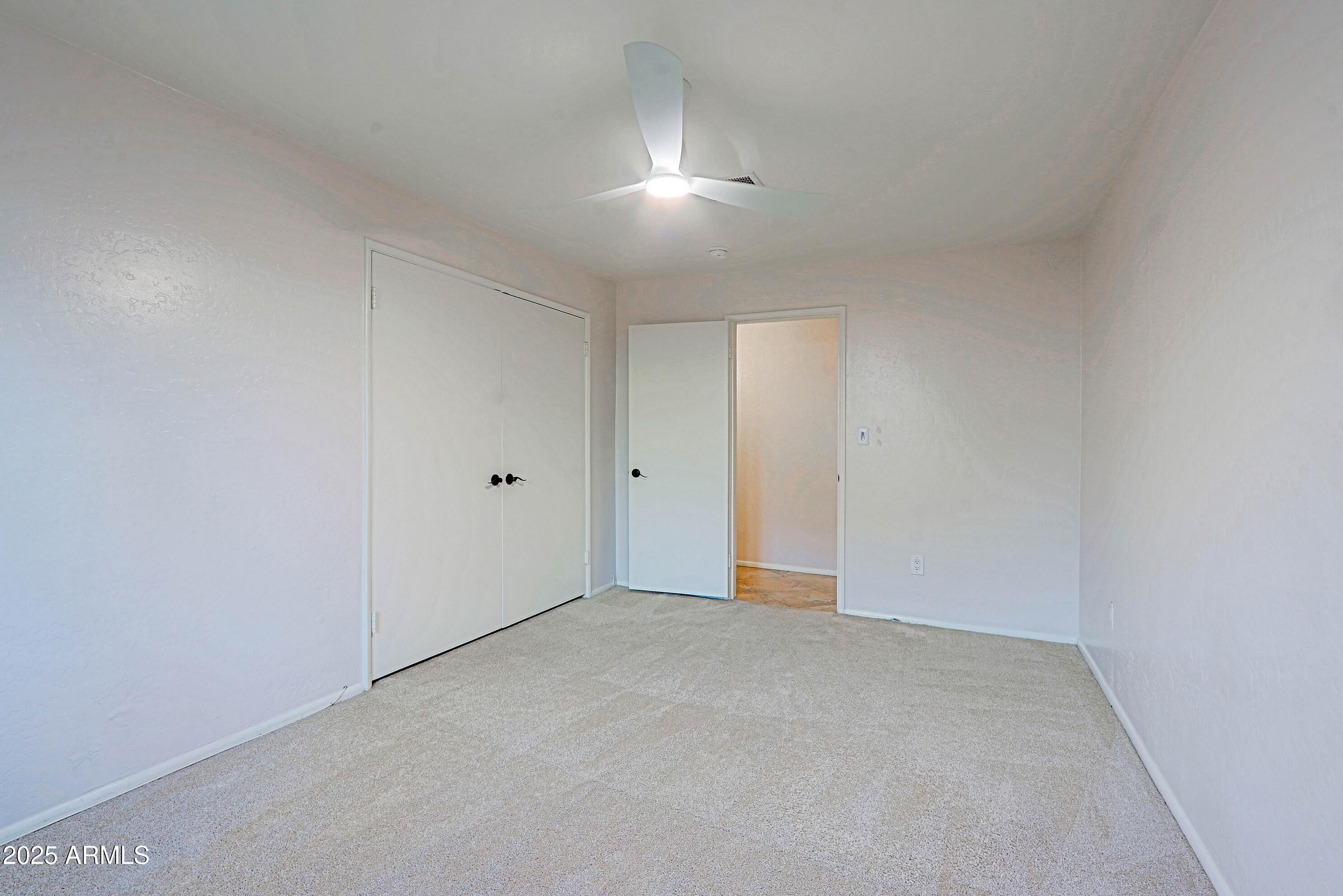 5509 East Cheery Lynn Road, Unit 2E Phoenix, AZ 85018 - Photo 16 of 25 a view of an empty room