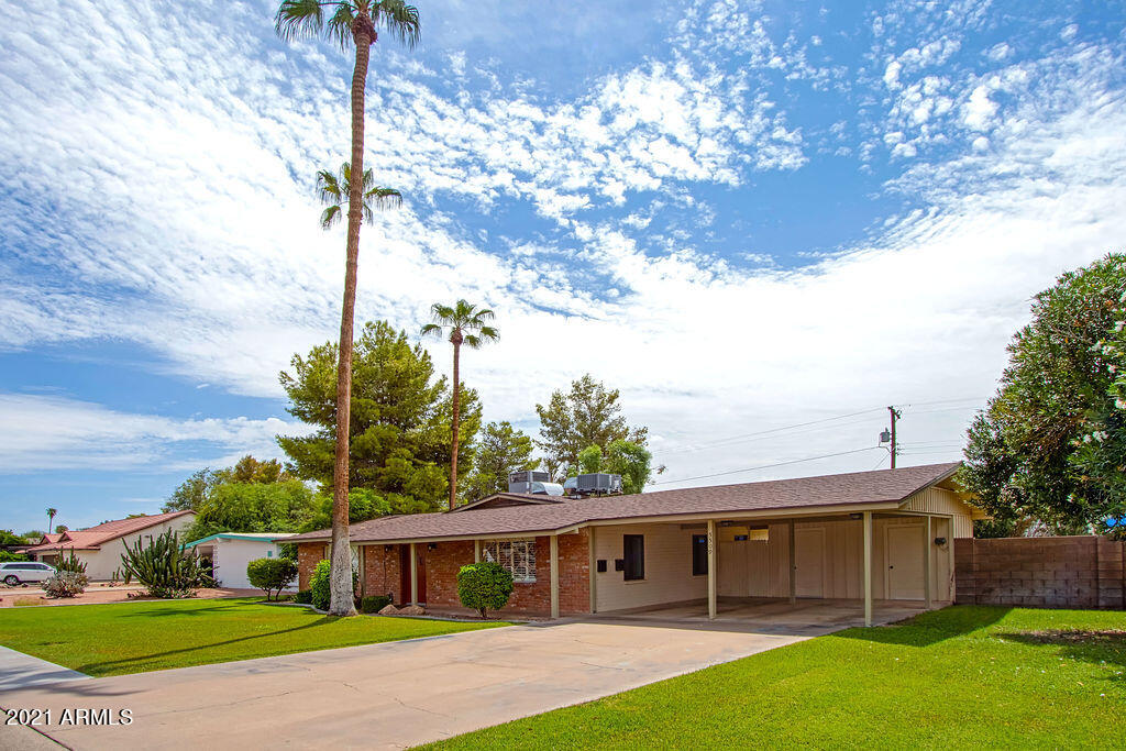 5509 East Cheery Lynn Road, Unit 2E Phoenix, AZ 85018 - Photo 25 of 25 a view of house with a yard