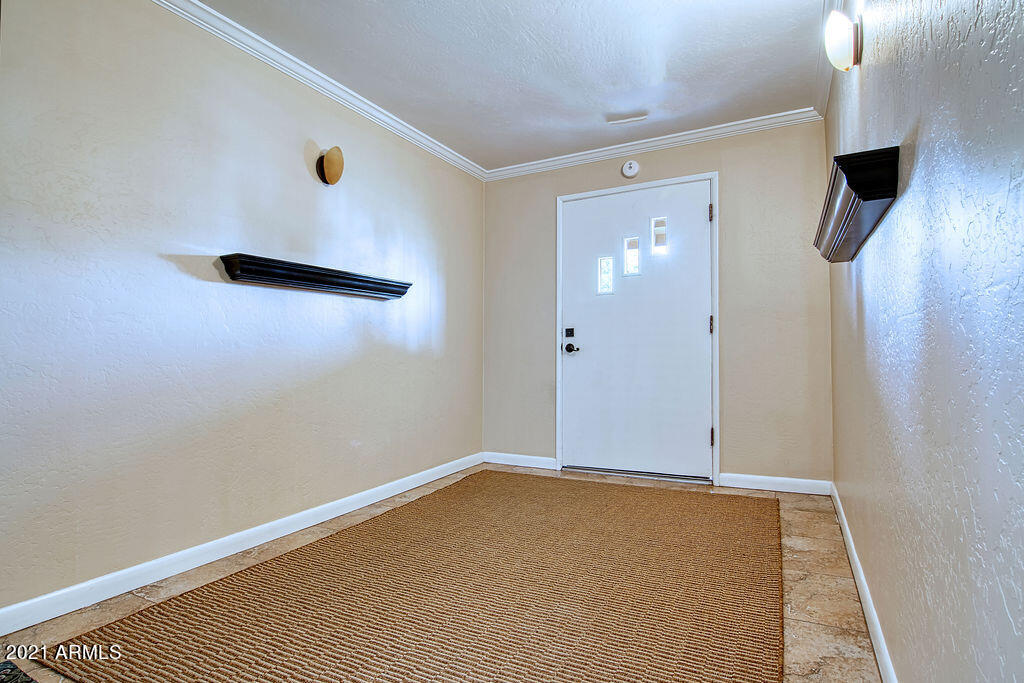 5509 East Cheery Lynn Road, Unit 2E Phoenix, AZ 85018 - Photo 5 of 25 a view of an empty room