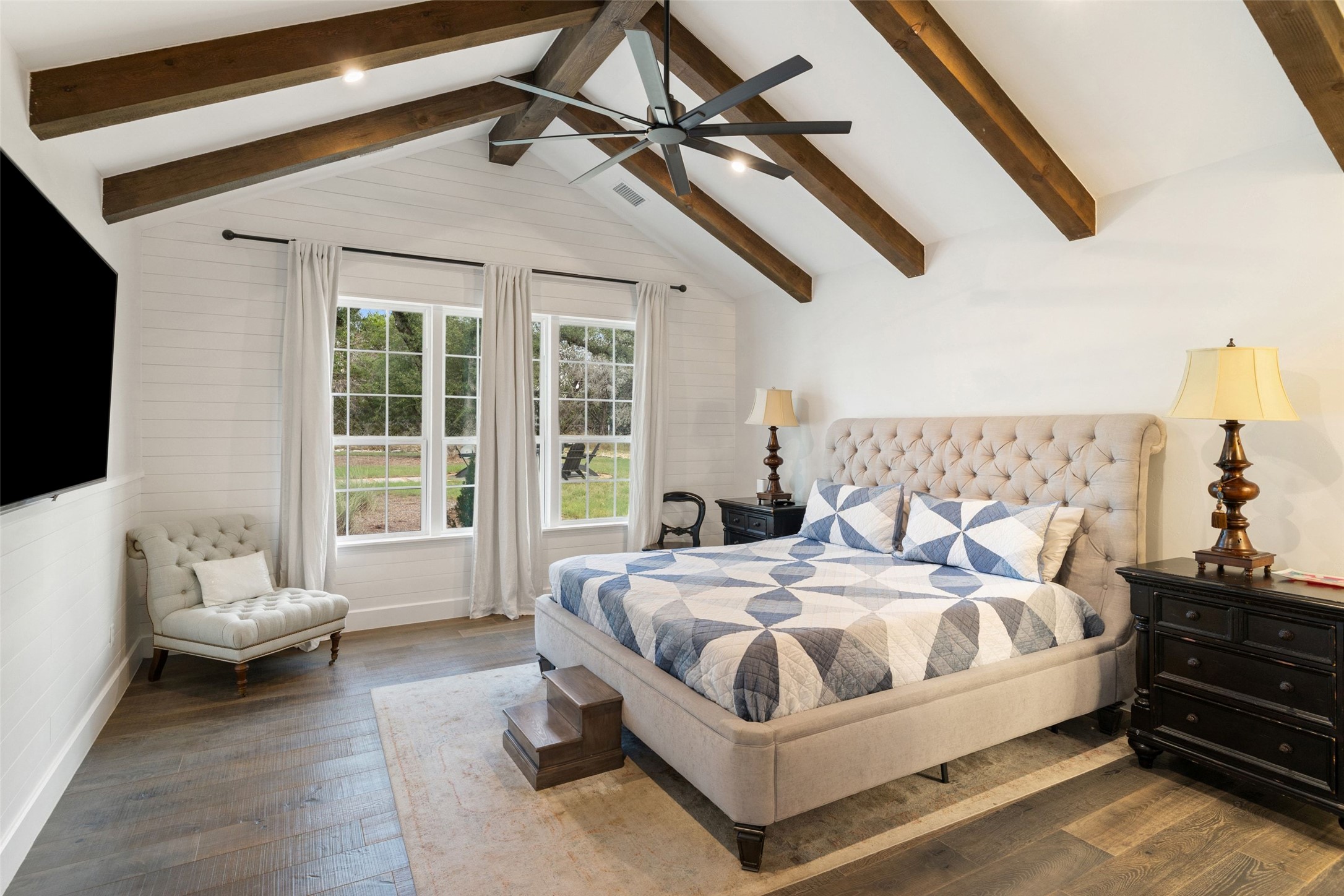 810 Kothmann Road Dripping Springs, TX 78620 - Photo 16 of 40 Rich wood plank flooring and cathedral ceilings with exposed beams define this relaxing retreat.