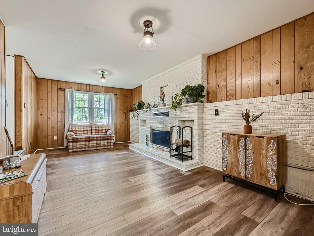 9019 Tammy Road Baltimore, MD 21236 - Photo 8 of 23 Family room with wood burning fireplace.