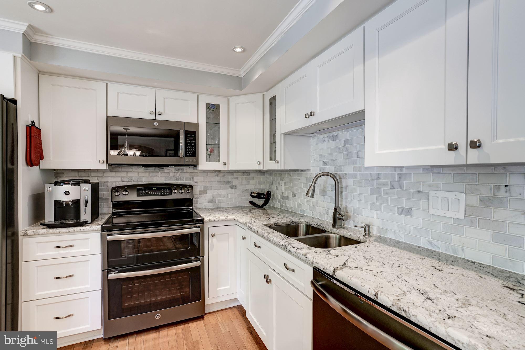 5826 Canvasback Road Burke, VA 22015 - Photo 11 of 30 Gourmet kitchen with stainless appliances