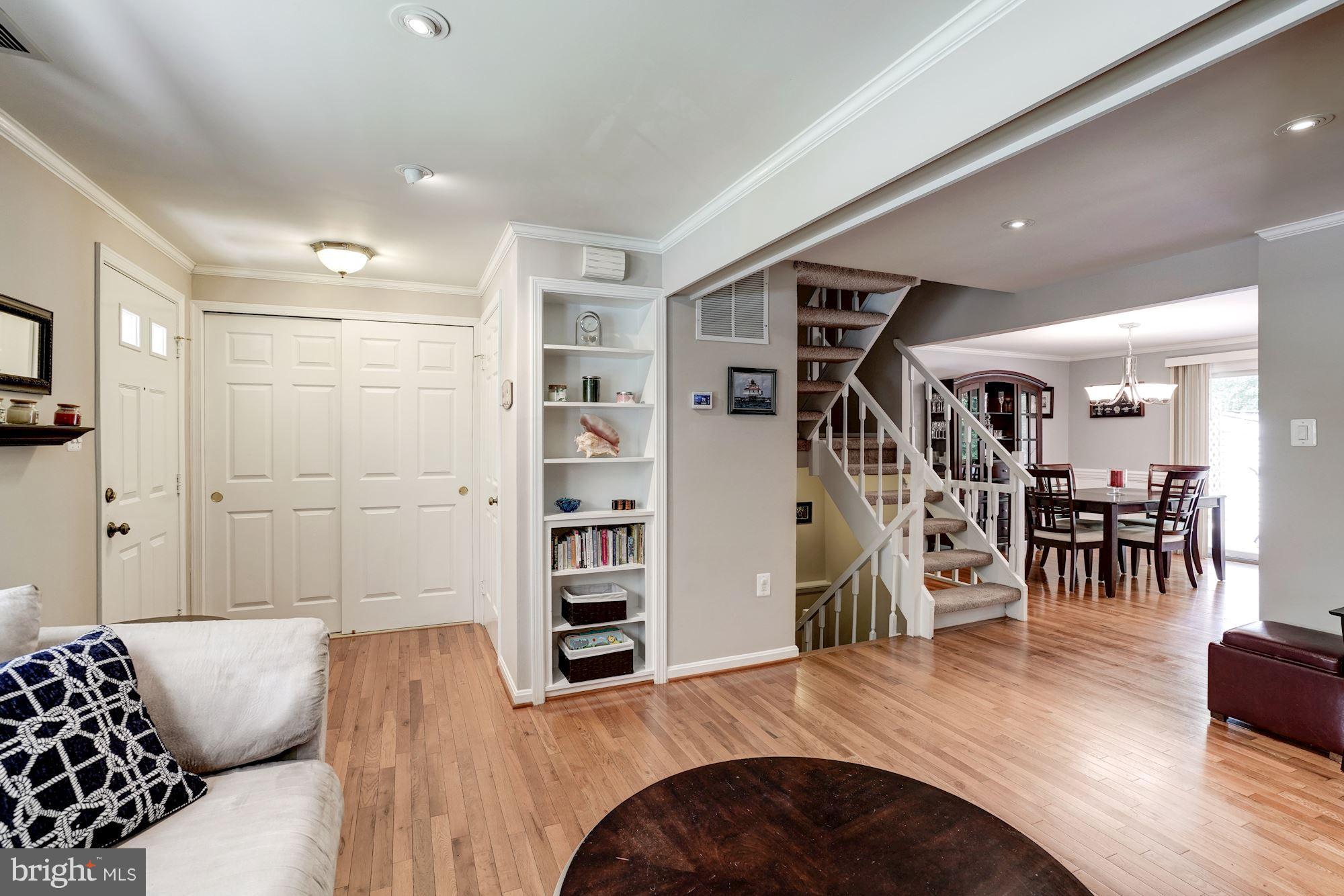 5826 Canvasback Road Burke, VA 22015 - Photo 6 of 30 Built in bookshelves in living room