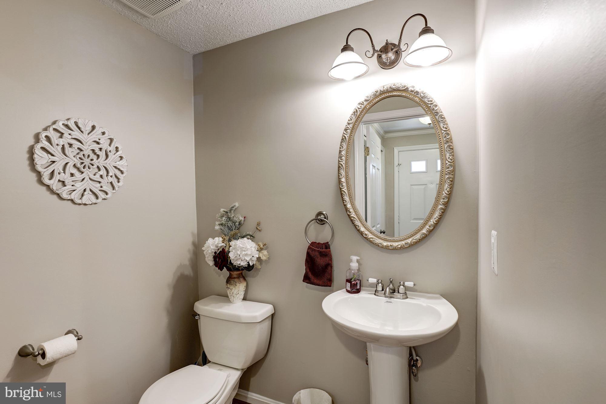 5826 Canvasback Road Burke, VA 22015 - Photo 7 of 30 Half bath on main level