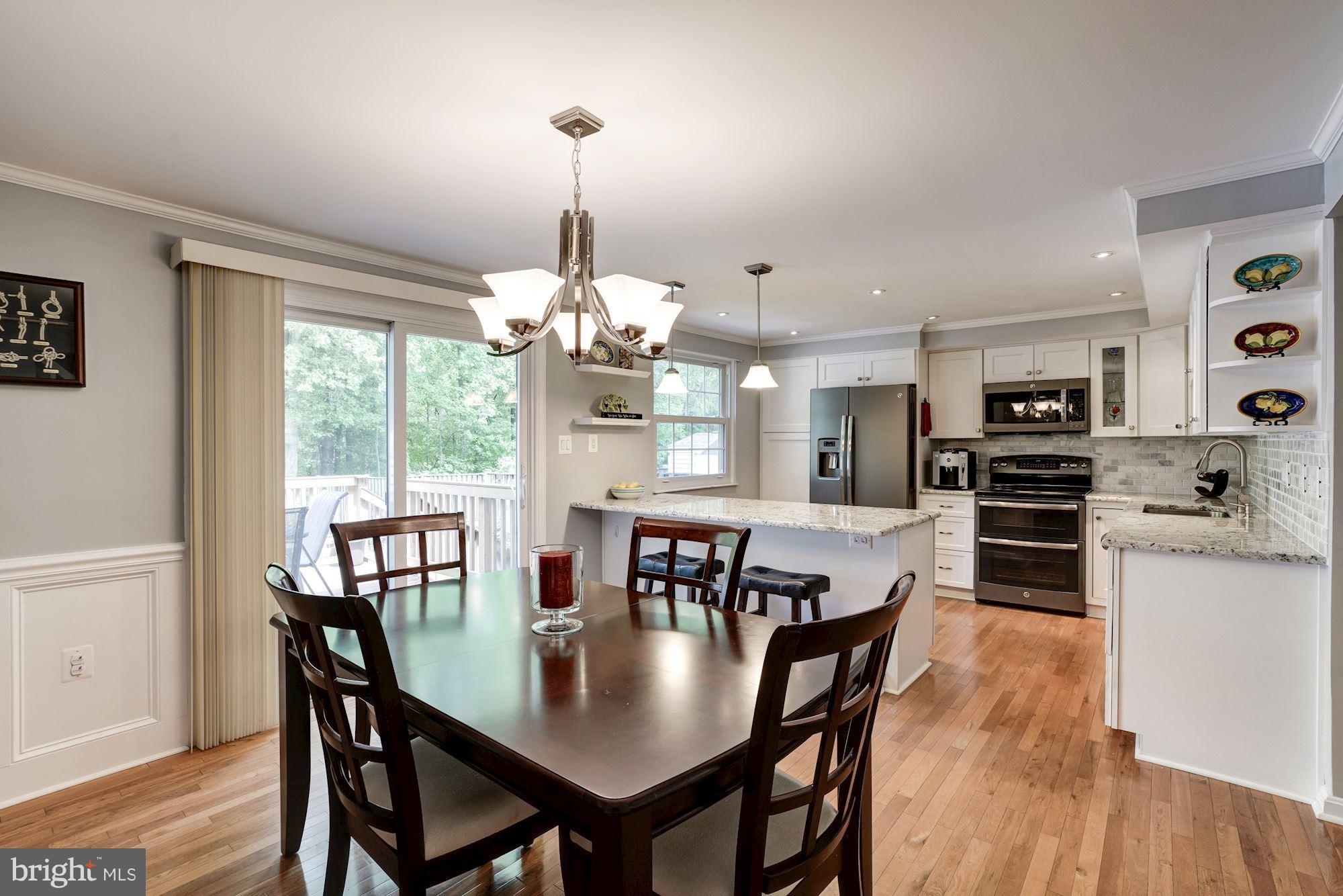 5826 Canvasback Road Burke, VA 22015 - Photo 8 of 30 Separate dining area adjacent to gourmet kitchen