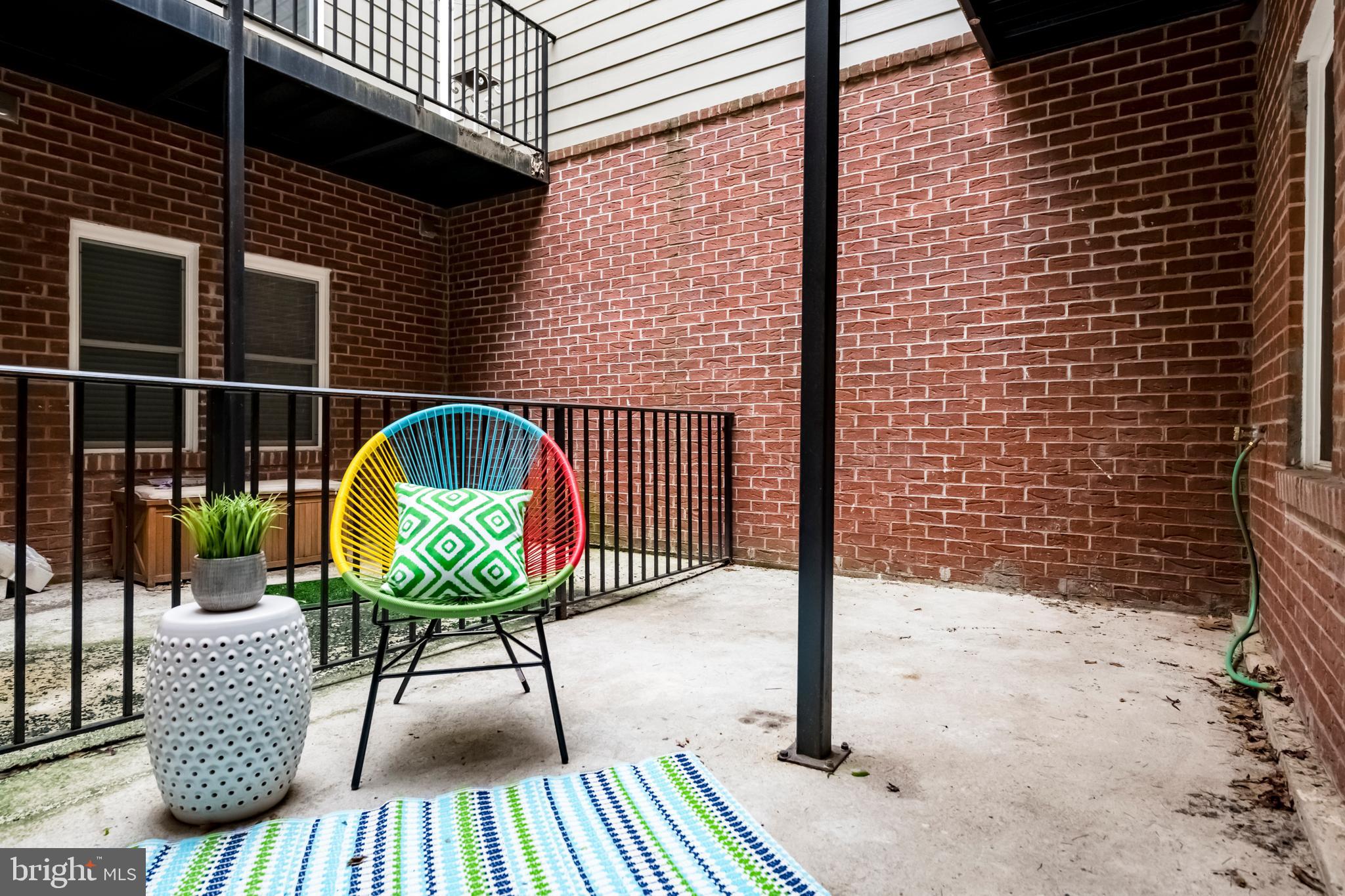 1928 3rd Street Northeast, Unit 2 Washington, DC 20002 - Photo 18 of 20 a view of balcony with wooden floor