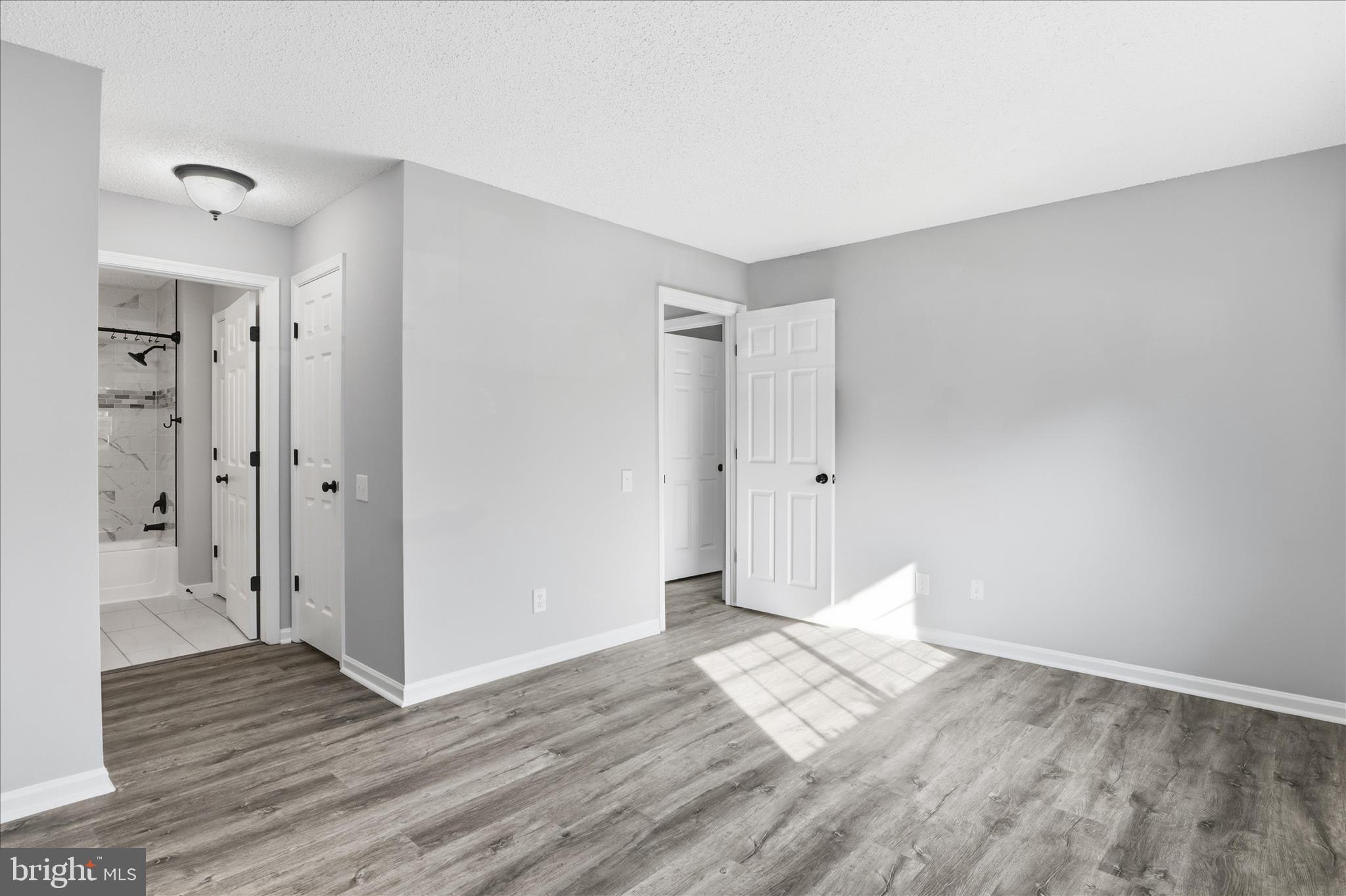 12002 Golf Ridge Court Fairfax, VA 22033 - Photo 18 of 43 a view of empty room with wooden floor