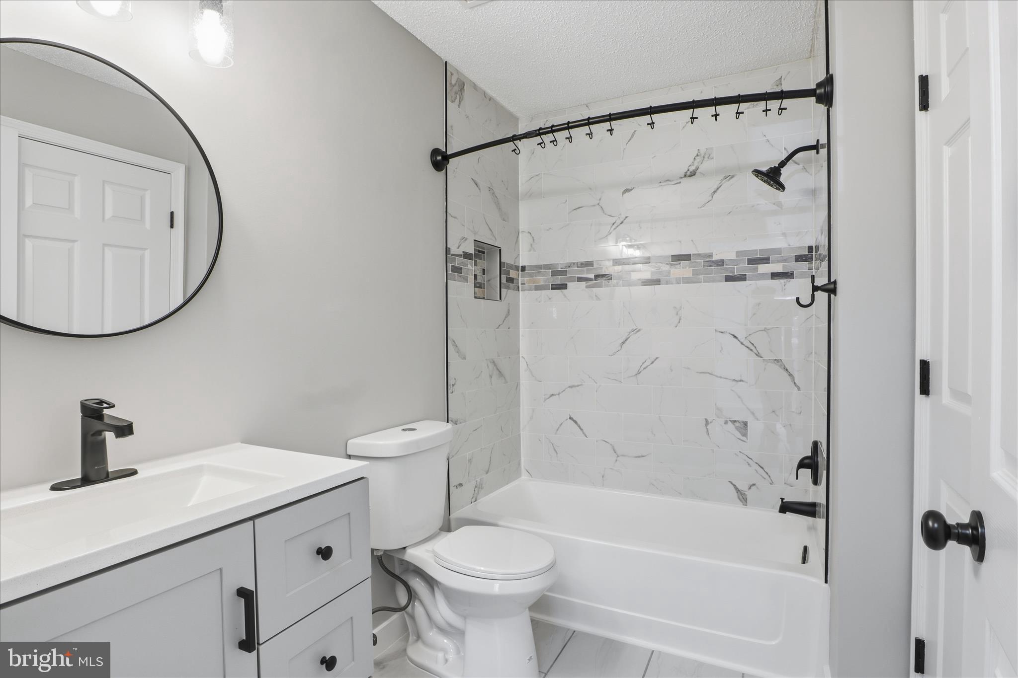 12002 Golf Ridge Court Fairfax, VA 22033 - Photo 20 of 43 a bathroom with a sink toilet and shower