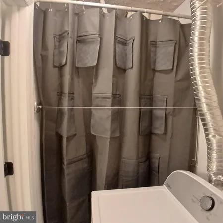 a bathroom with a sink and a shower