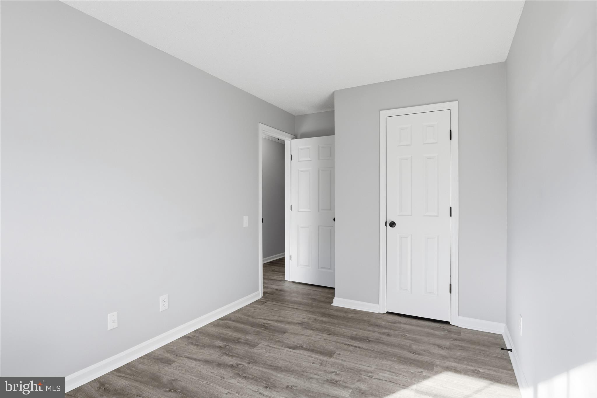 12002 Golf Ridge Court Fairfax, VA 22033 - Photo 24 of 43 a view of an empty room and wooden floor