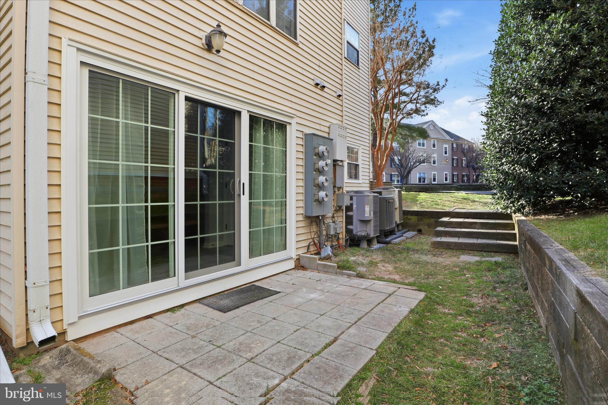 12002 Golf Ridge Court Fairfax, VA 22033 - Photo 26 of 43 a view of a house with a large window and wooden fence