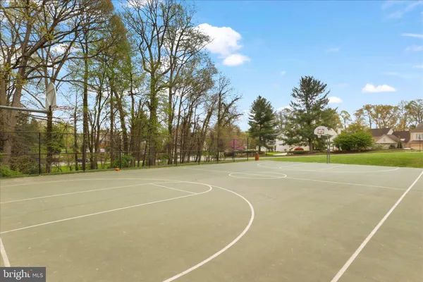 a view of an outdoor space and tennis court