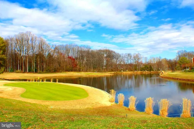 a view of a playground with basketball court