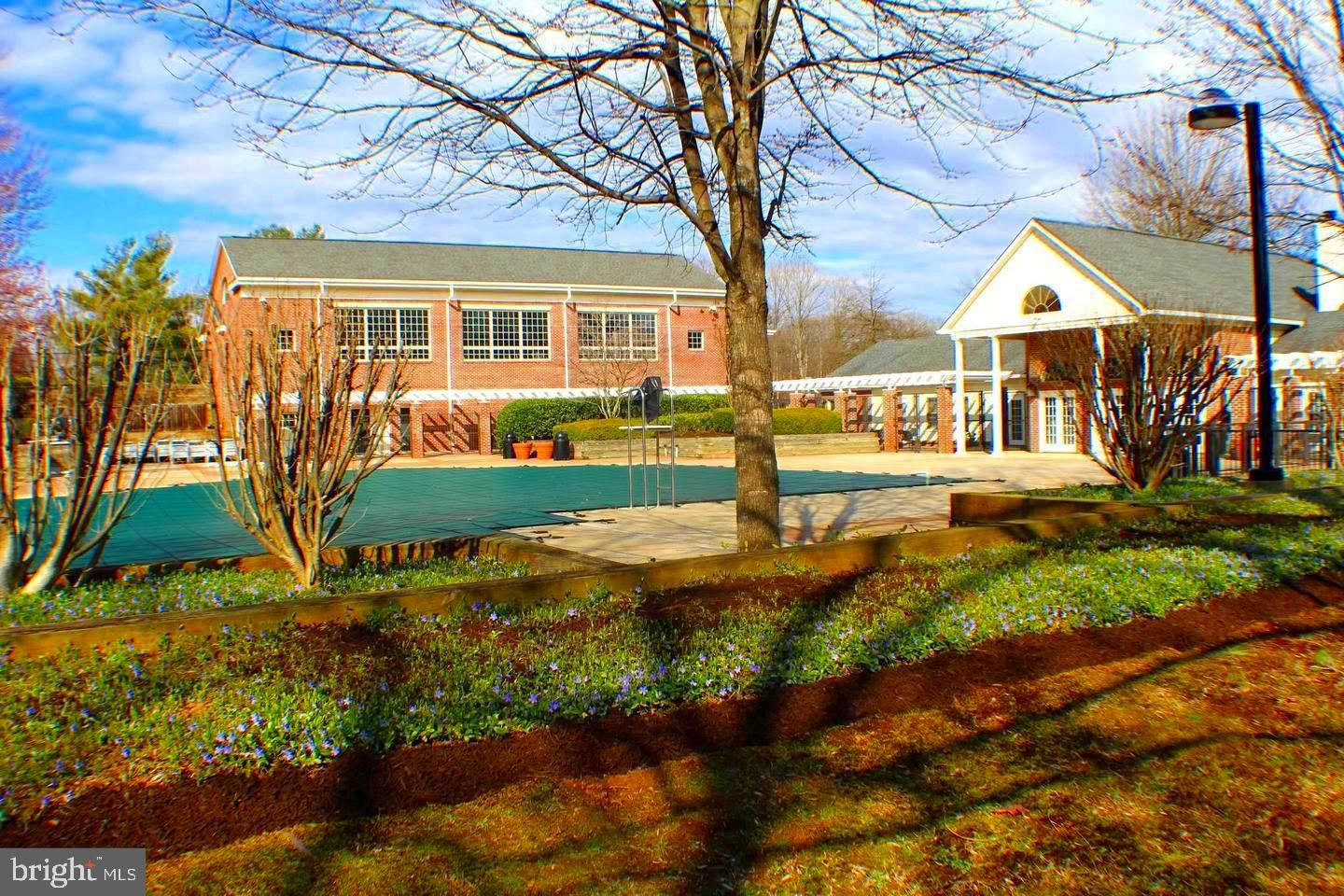 12002 Golf Ridge Court Fairfax, VA 22033 - Photo 35 of 43 a view of a house with backyard and sitting area