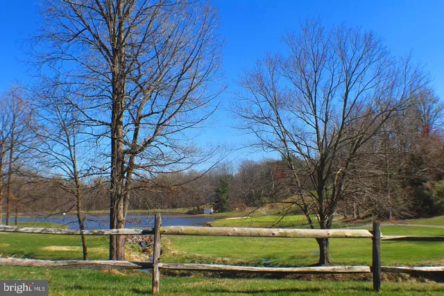 a view of a golf club with a big yard