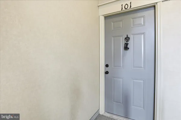 a view of a bathroom from a hallway