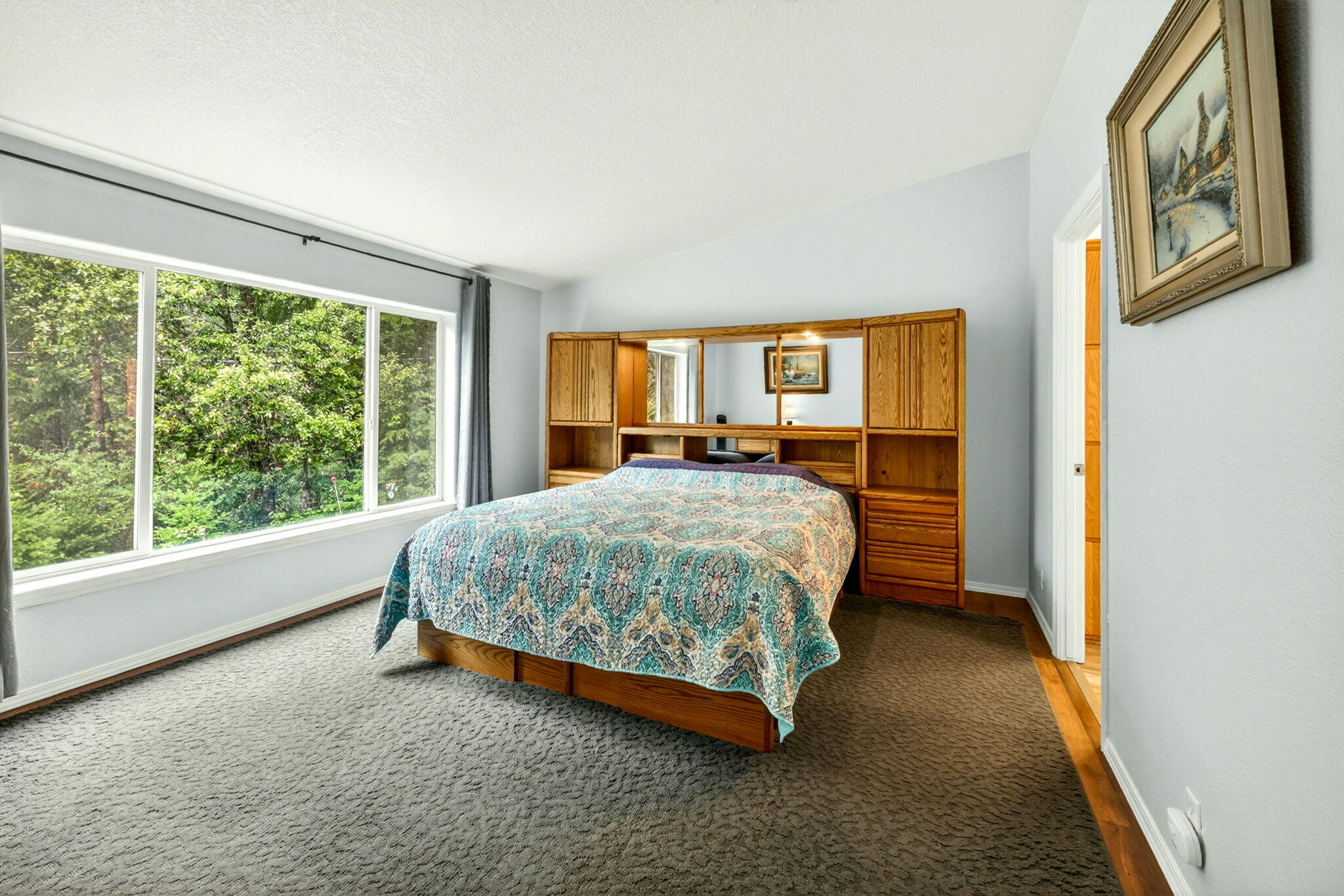 5445 Thompson Creek Road Selma, OR 97538 - Photo 25 of 57 a bedroom with a bed and window