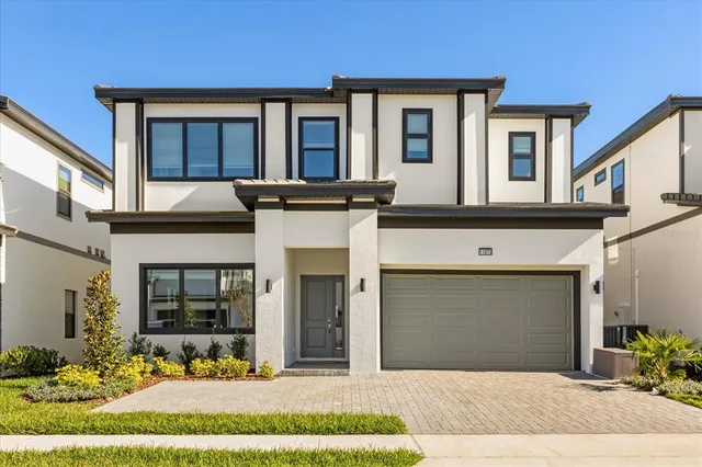 a front view of a house with yard