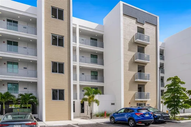 a front view of a building with a street