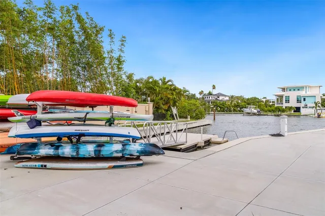 a view of a patio with a table and chairs