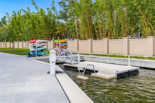 a view of a swimming pool with a lounge chairs