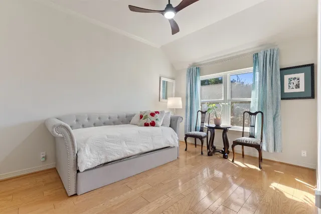 a bathroom with a double vanity sink toilet and a mirror