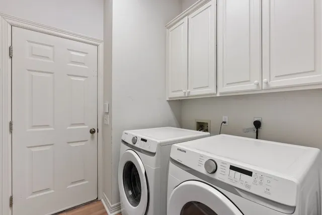 a bedroom with a bed and a table