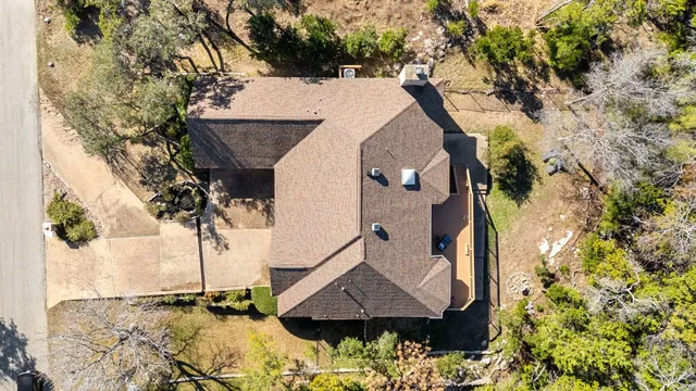 a backyard of a house with lots of green space
