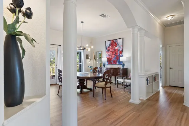 a view of a livingroom with furniture and a dinning table