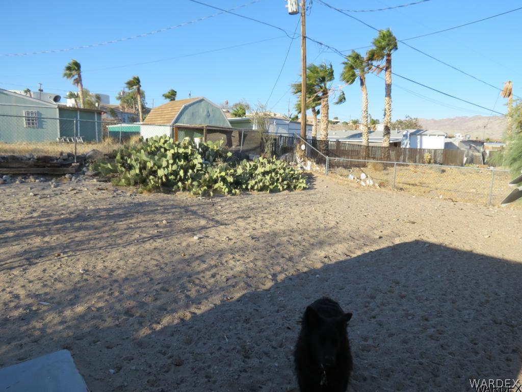 1688 Toro Road Bullhead City, AZ 86442 - Photo 28 of 32 Chain link fencing back yard