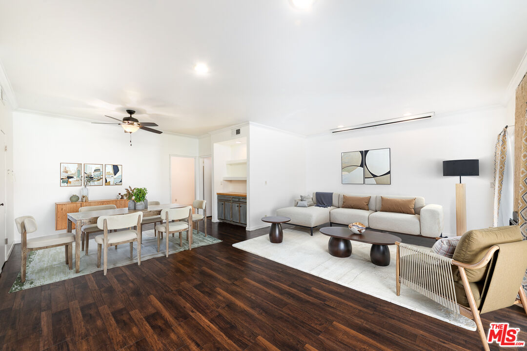 5139 Balboa Boulevard, Unit 9 Encino, CA 91316 - Photo 1 of 30 a living room with furniture and a wooden floor