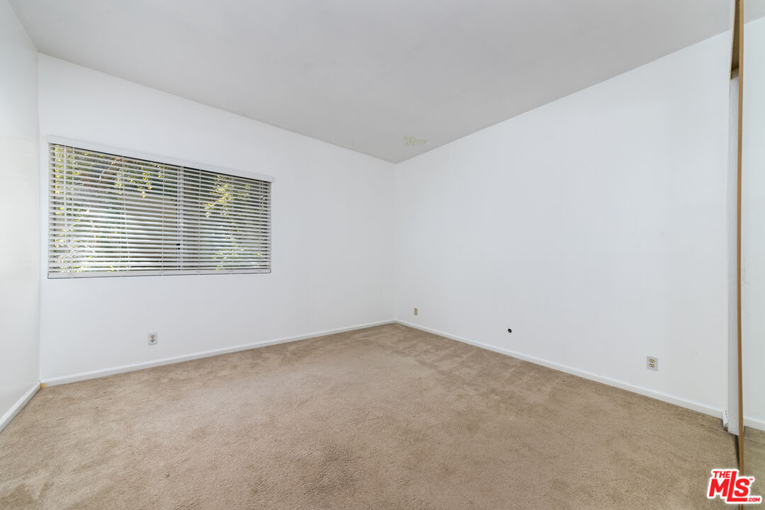 5139 Balboa Boulevard, Unit 9 Encino, CA 91316 - Photo 14 of 30 an empty room with a window