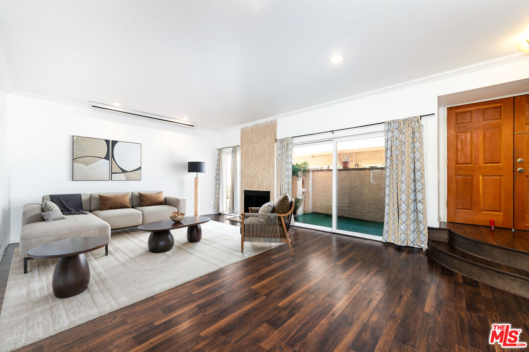 5139 Balboa Boulevard, Unit 9 Encino, CA 91316 - Photo 2 of 30 a living room with furniture and a wooden floor