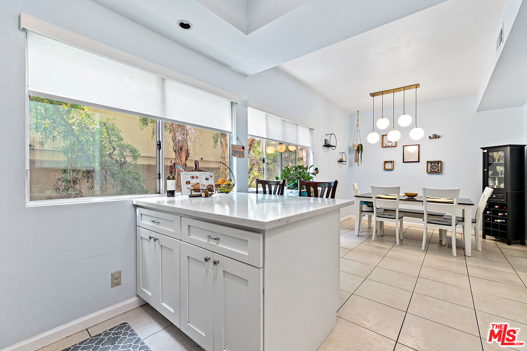 5139 Balboa Boulevard, Unit 9 Encino, CA 91316 - Photo 21 of 30 a kitchen with a sink and cabinets