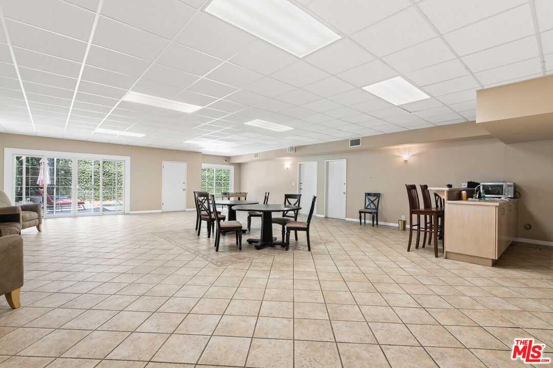 5139 Balboa Boulevard, Unit 9 Encino, CA 91316 - Photo 27 of 30 a view of a dining room with furniture