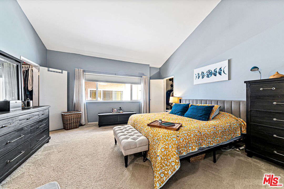 5139 Balboa Boulevard, Unit 9 Encino, CA 91316 - Photo 7 of 30 a bedroom with a bed and a couch